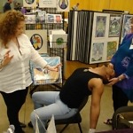 Lisa Rhyne doing energy healing SOULutions session.